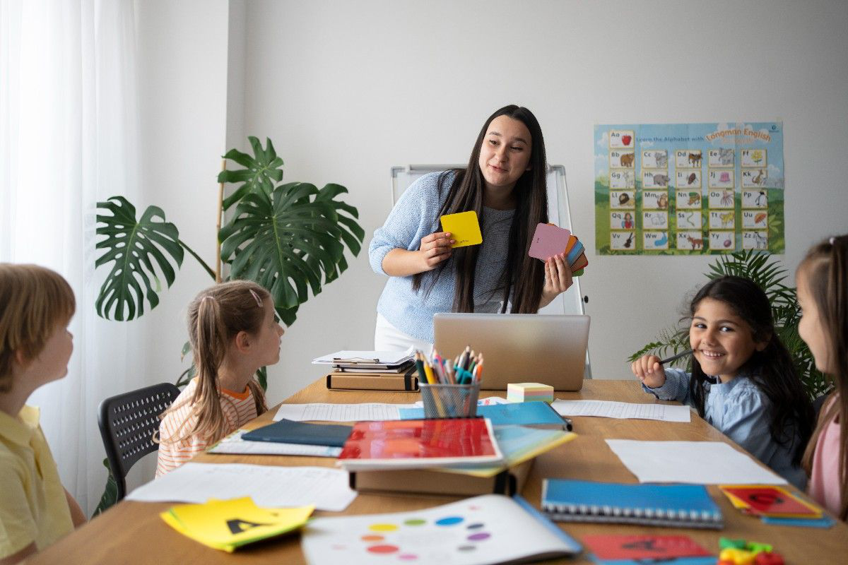 A Montessori teacher taking class for students